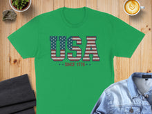 Load image into Gallery viewer, Green t-shirt with distressed "USA Since 1776" text in flag design.