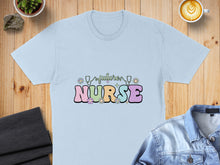 Load image into Gallery viewer, Light blue t-shirt with "Future Nurse" text and floral graphic.