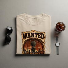 Load image into Gallery viewer, T-shirt with a "Wanted" poster design featuring a vintage microphone and desert landscape.