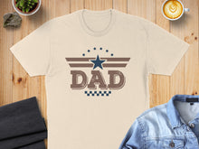 Load image into Gallery viewer, Cream t-shirt with "DAD" logo featuring stars and checkered pattern.