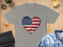 Load image into Gallery viewer, Gray t-shirt with distressed American flag heart graphic.