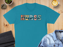 Load image into Gallery viewer, Teal t-shirt with "NURSE" in colorful, retro bubble lettering.
