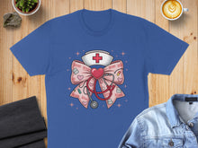 Load image into Gallery viewer, Blue t-shirt featuring a nurse's cap, stethoscope, and "XOXO" text on a bow.
