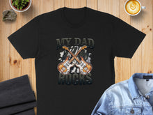 Load image into Gallery viewer, Black t-shirt with two guitars and "MY DAD ROCKS" text.