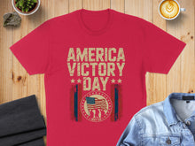 Load image into Gallery viewer, Red t-shirt with "America Victory Day" text, American flag graphic, and stars.
