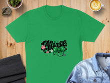 Load image into Gallery viewer, Green t-shirt with "Nurse" text, bow, flowers, and stethoscope graphic.