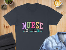 Load image into Gallery viewer, "Nurse Life" text with medical icons on a dark grey t-shirt.