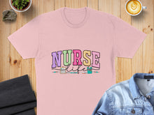Load image into Gallery viewer, Pink t-shirt with "Nurse Life" text and medical icons.