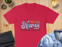 Load image into Gallery viewer, Registered Nurse t-shirt with stethoscope and syringe graphics.