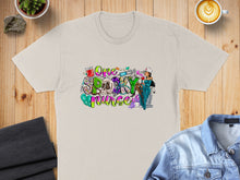 Load image into Gallery viewer, "One Spooky Nurse" text with Halloween and medical graphics on a tan t-shirt.