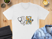 Load image into Gallery viewer, White t-shirt with "RN" text featuring a stethoscope, spider, and eye graphics.