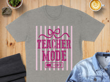 Load image into Gallery viewer, Gray t-shirt with "Teacher Mode" text and bow graphic.