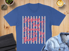 Load image into Gallery viewer, Blue t-shirt with text "Helping Tiny Humans Do Big Things" and ribbon graphics.