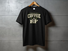 Load image into Gallery viewer, Black t-shirt with "Powered by Coffee and RF" graphic and coffee cup icon.