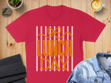 Load image into Gallery viewer, Red t-shirt with orange "LUNCH DAY" text and a yellow bow.