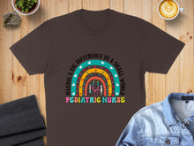 Load image into Gallery viewer, Brown t-shirt with rainbow and "Pediatric Nurse" text.