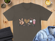 Load image into Gallery viewer, Brown t-shirt with "Peace, Love, Nursing" text and stethoscope, heart, and cup graphics.
