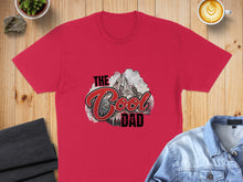 Load image into Gallery viewer, Red t-shirt with "The Cool Dad" text and mountain graphic.