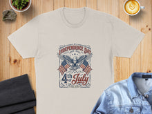 Load image into Gallery viewer, Cream t-shirt with "Independence Day 4th of July Est. 1776" and American flags.