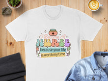 Load image into Gallery viewer, White t-shirt with "I Became A Nurse because your life is worth my time" text.