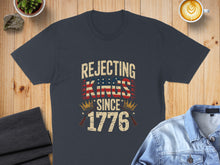 Load image into Gallery viewer, Navy t-shirt with "Rejecting Kings Since 1776" text in patriotic colors.