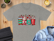 Load image into Gallery viewer, Four decorated coffee drinks with nurse and medical-themed designs.