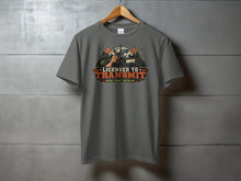 Load image into Gallery viewer, Grey t-shirt with "Licensed to Transmit" graphic featuring radio equipment and mountains.