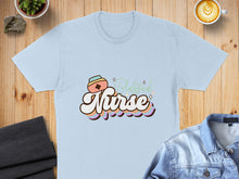 Load image into Gallery viewer, Light blue t-shirt with "Blessed Nurse" text and retro design elements.