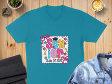 Load image into Gallery viewer, Teal t-shirt with "Senior Class of 2026" in colorful letters and graduation motifs.