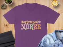 Load image into Gallery viewer, Purple t-shirt with "Registered Nurse" text in retro floral lettering.