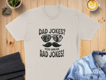 Load image into Gallery viewer, Cream t-shirt with sunglasses, mustache, and "Dad Jokes? You Mean Rad Jokes!" text.