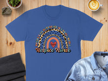 Load image into Gallery viewer, Blue t-shirt with "Hospice Nurse" and rainbow design.
