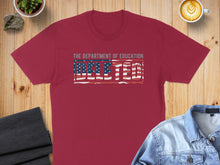 Load image into Gallery viewer, Maroon t-shirt with "The Department of Education BELTED" text and American flag graphic.
