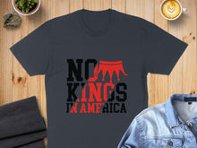 Load image into Gallery viewer, Dark gray t-shirt with "NO KINGS IN AMERICA" and a red crown design.