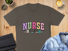 Load image into Gallery viewer, Brown t-shirt with colorful "NURSE life" text and medical icons.
