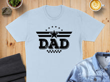 Load image into Gallery viewer, Light blue t-shirt with black "DAD" text and star graphic.