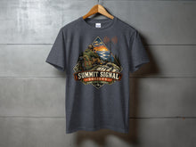 Load image into Gallery viewer, Summit Signal Society t-shirt featuring a radio operator on a mountain at sunset.