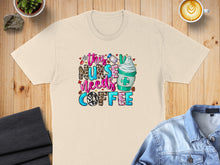 Load image into Gallery viewer, Cream t-shirt with "this nurse needs coffee" text and a latte.
