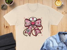 Load image into Gallery viewer, Pink nurse bow with stethoscope, heart, and "XOXO" text.