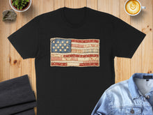 Load image into Gallery viewer, Black t-shirt with a distressed American flag patch sewn onto the chest.