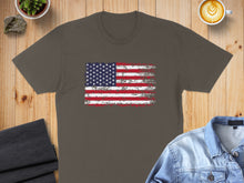 Load image into Gallery viewer, Distressed American flag graphic on a brown t-shirt.