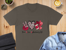 Load image into Gallery viewer, Brown t-shirt with peace sign, leopard heart, and pills design.