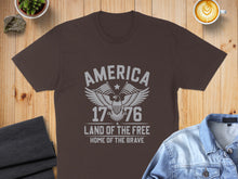 Load image into Gallery viewer, Brown t-shirt with "America Land of the Free Home of the Brave" and eagle graphic.