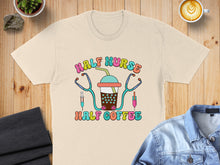 Load image into Gallery viewer, Beige t-shirt with "Half Nurse Half Coffee" design featuring stethoscope and syringe.