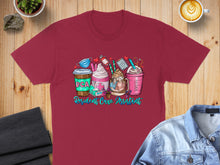 Load image into Gallery viewer, T-shirt with colorful medical-themed drinks and "RCA Resident Care Assistant" text.