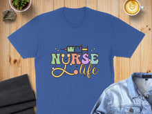 Load image into Gallery viewer, Blue t-shirt with "Nurse Life" text and syringe graphic.