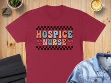 Load image into Gallery viewer, Maroon t-shirt with "Hospice Nurse" text and heart and pulse graphics.