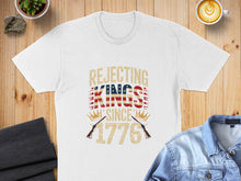 Load image into Gallery viewer, White t-shirt with "Rejecting Kings Since 1776" text and American flag accents.