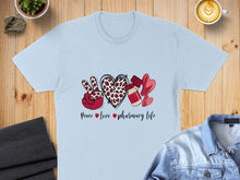 Load image into Gallery viewer, Light blue t-shirt with "Peace Love Pharmacy Life" design and leopard print heart.