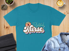 Load image into Gallery viewer, Teal t-shirt with "Blessed Nurse" text in retro font and colorful outlines.